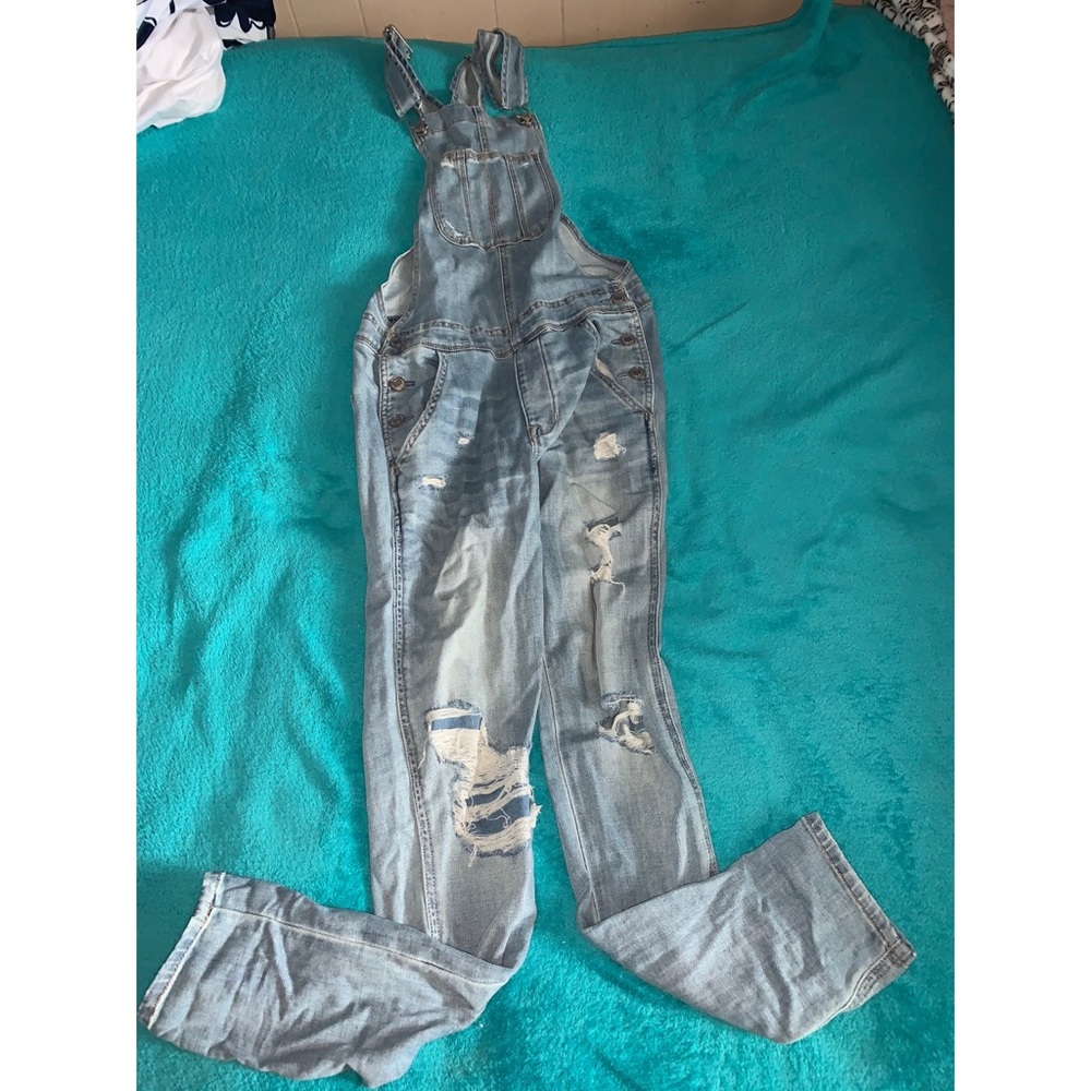 Light wash destroyed American Eagle overalls